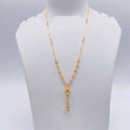 Gold necklace on a mannequin bust with weight indication