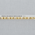 A gold-toned link bracelet with white inlay details, displayed horizontally on a light gray textured fabric background with a white paper label underneath showing specifications.