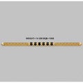 A gold-toned filigree bracelet with a central row of black diamond-shaped stones, shown horizontally on a plain gray background with text indicating weight and gemstone count.