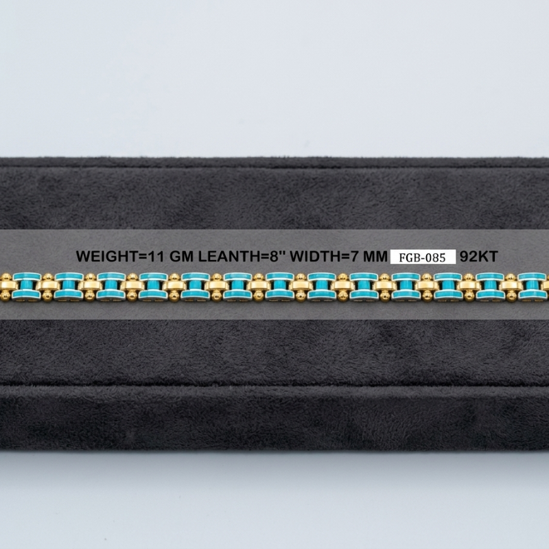 A yellow gold bracelet with turquoise blue bezel-set round stones, displayed horizontally on a black velvet jewelry box. The image includes a text overlay with specifications: 'WEIGHT=11 GM LEANTH=8" WIDTH=7 MM FCB-085 12KT'.