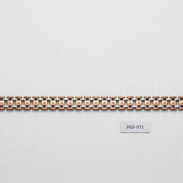 A delicate rose gold chain bracelet with gold-toned end caps and a small label below reading FGB-071, displayed on a light gray textured background.