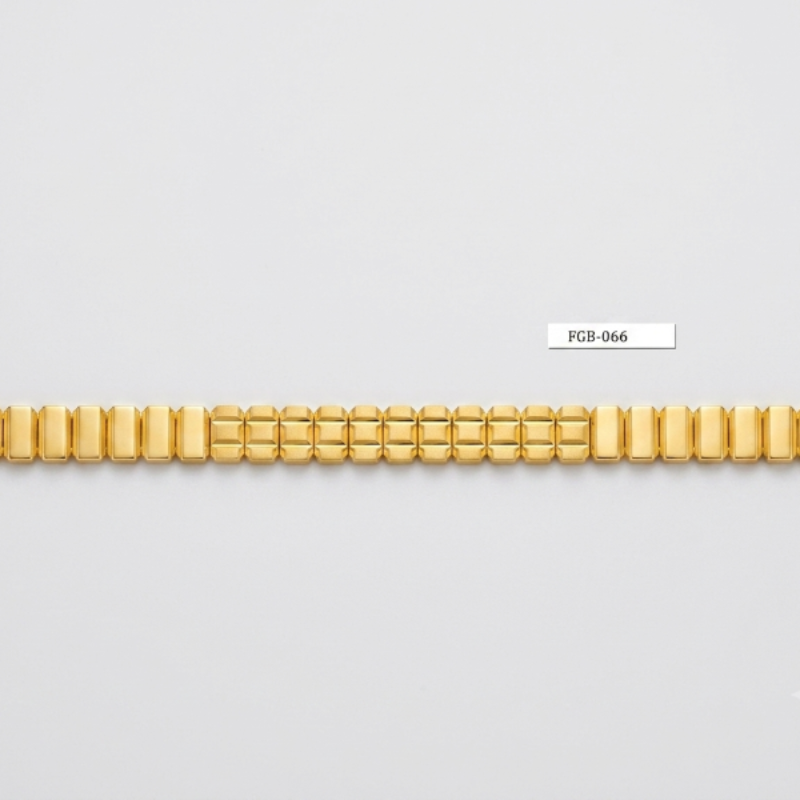 A gold-toned metal link bracelet with a textured, segmented design, displayed horizontally on a light gray background with a small code label 'PCB-066' above it.