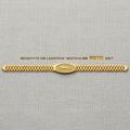 A gold chain bracelet with a central oval medallion featuring a cheetah logo, displayed on a textured light gray fabric background. Text above the bracelet lists its specifications: weight 15 GM, leath 8" width 8 MM, and code PGP-110 92KT.