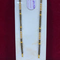 Two black and gold beaded bracelets on a white card with a visible brand tag.