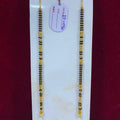 Two beaded necklaces on a white card with a red background