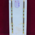 Two beaded bracelets on a white card with a red background