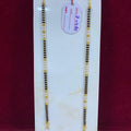 Two gold necklaces on a white card with a red background