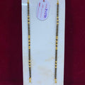 Two gold necklaces on a white card with a red background