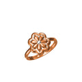 A rose gold flower-shaped ring with a small clear central gemstone, shown on a plain white background with a small product code label and 'IO' logo at the bottom.