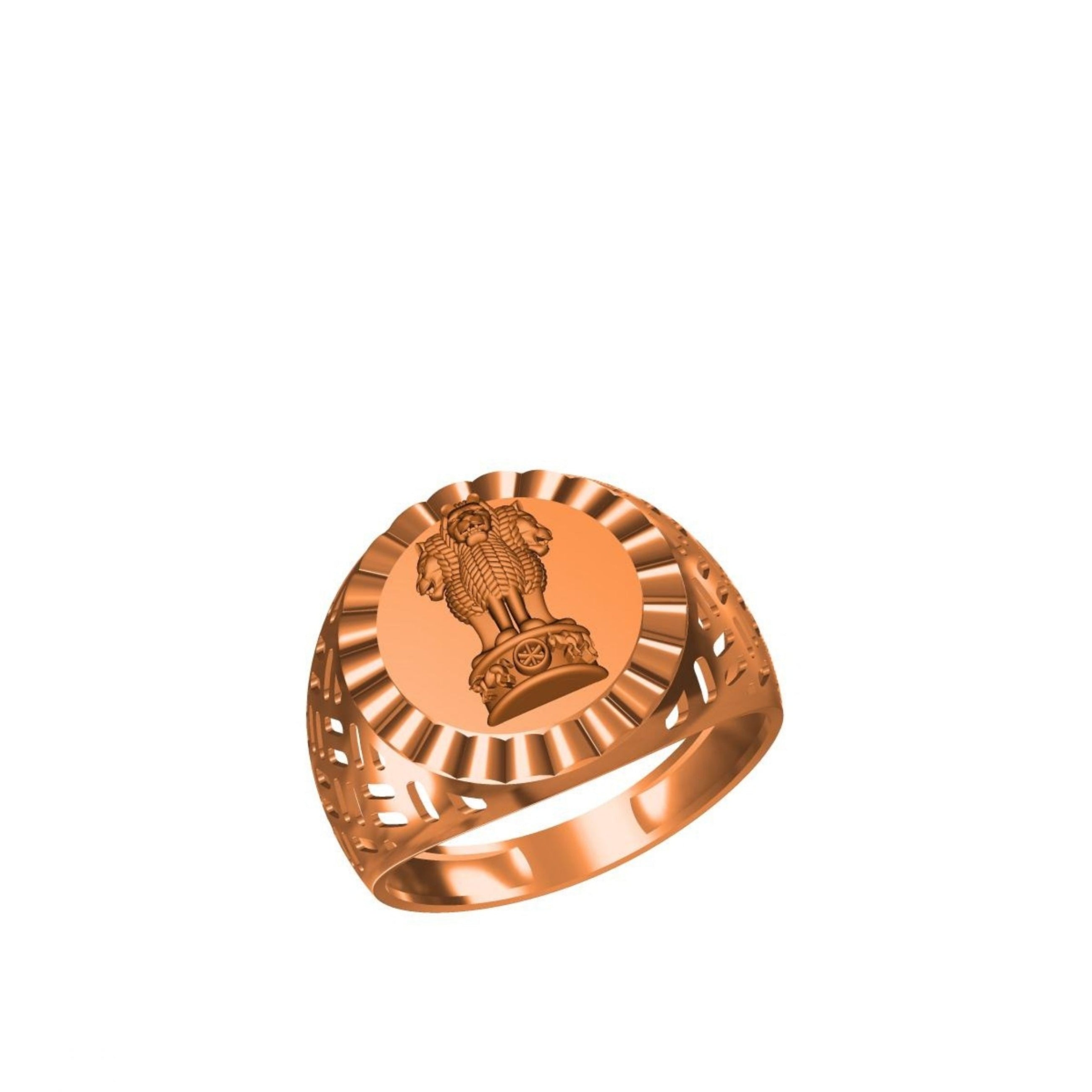 A rose gold signet ring featuring an embossed emblem of the Ashoka Chakra on a circular face, surrounded by a sunburst pattern and a slanted band, shown on a plain white background.