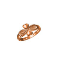 A rose gold ring featuring three hearts arranged in a trefoil shape over a twisted band with parallel grooves, shown on a plain white background with a model number and brand logo at the bottom.