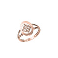 A rose gold ring with a geometric openwork design, shown on a plain white background with a small color swatch label and 'DC' logo at the bottom.