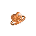 A rose gold ring featuring a heart-shaped top with an embossed flower motif, displayed on a clean white background with a small product code label and 'JC' logo at the bottom.