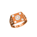 A rose gold signet ring with a square face featuring a central silver circular emblem and four small silver diamond-shaped inlays, shown on a plain white background with a model code label and logo at the bottom.