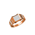 A rose gold ring with a geometric, multi-faceted band featuring a central pavé diamond setting and side channel diamonds, shown on a plain white background with a technical spec sheet and 'DC' logo in the bottom-left corner.