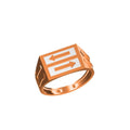 A rose gold signet ring with a white rectangular face featuring two double-headed arrows, shown on a plain white background with a small model number and logo at the bottom.