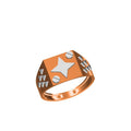 A rose gold signet ring with a faceted geometric band, featuring a central silver star and silver geometric accents, shown on a plain white background with a model number and brand logo at the bottom.