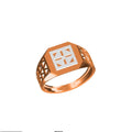 A rose gold signet ring with a white inlay featuring a cross and geometric patterns, shown on a plain white background with a model number and brand logo at the bottom.