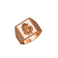 A rose gold signet ring featuring a detailed Ganesha illustration on a light beige faceplate, with textured beaded borders on the sides, shown against a plain white background.