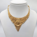 Gold necklace on a mannequin with weight and material information displayed.