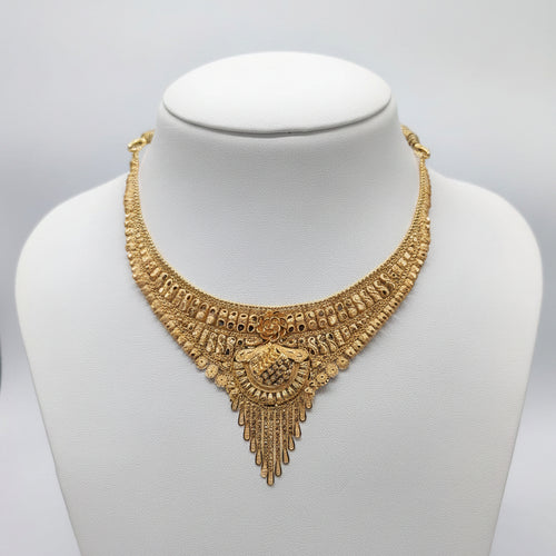 Gold necklace on a mannequin with weight displayed